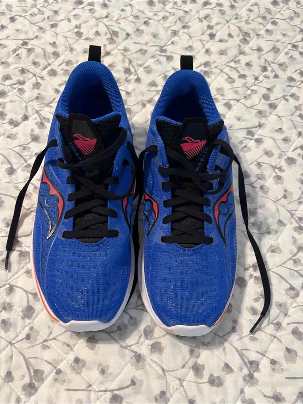 Saucony women’s Blue Sneakers with Pink Accent and Black Laces